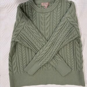 Soft green cable sweater